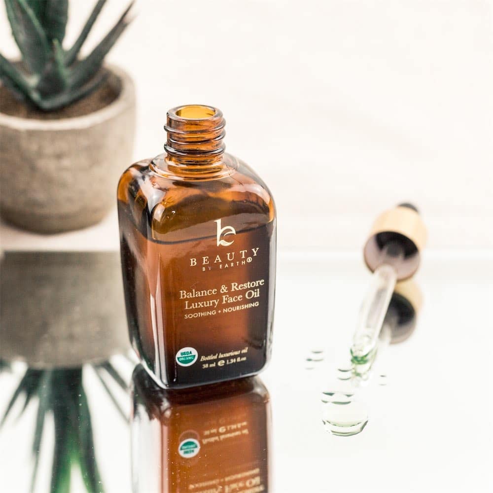 Beauty by Earth's Balance & Restore Luxury Face Oil