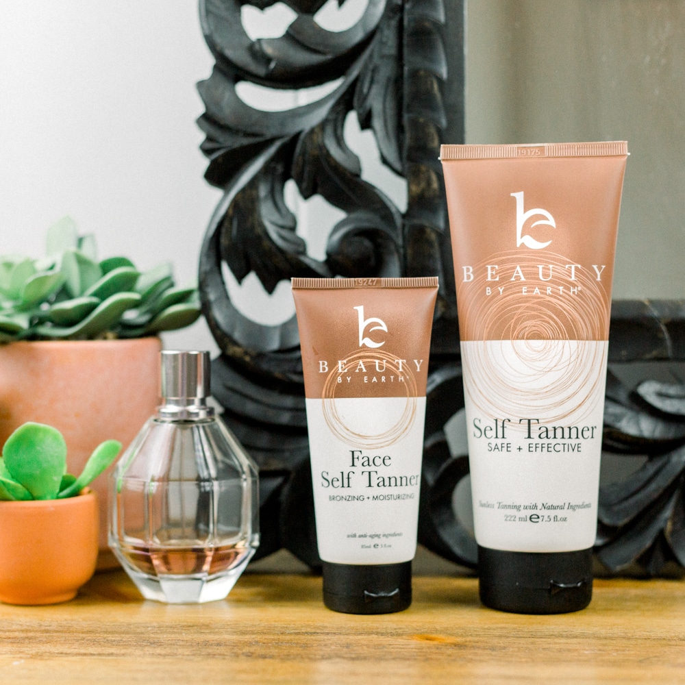 Beauty by Earth Face and Body Self Tanner on a vanity