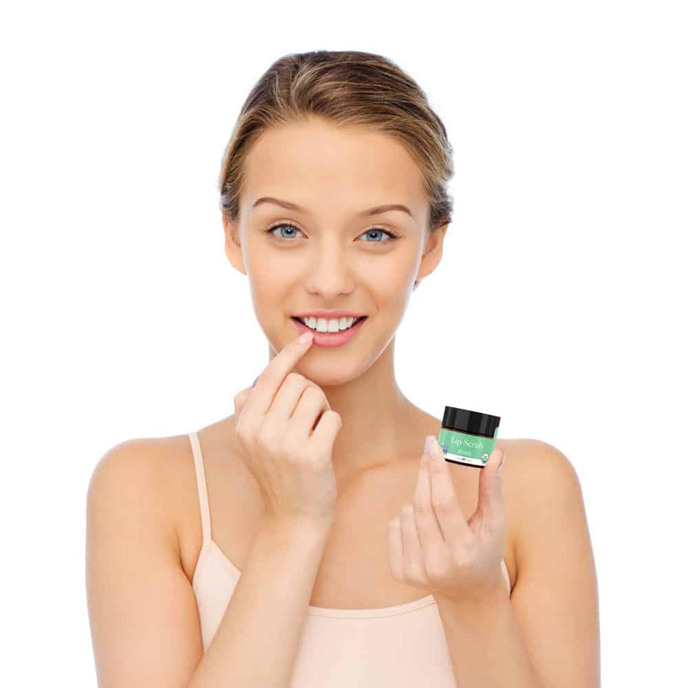 Girl holding jar and touching lips_Website Image