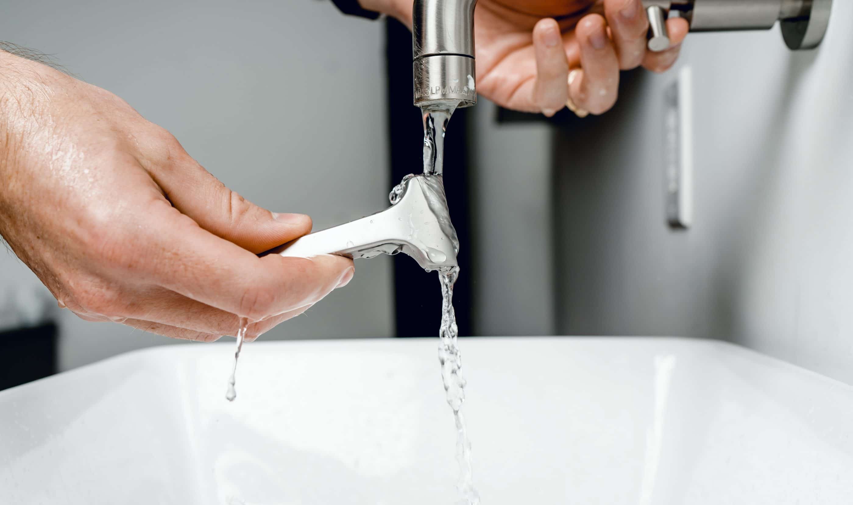 shaving in sink