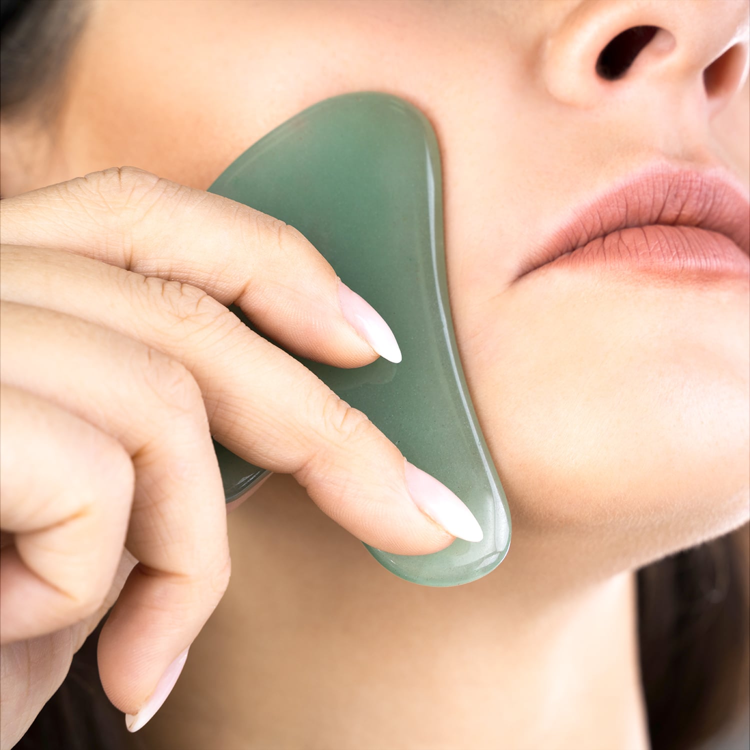 Young Woman Doing Gua Sha - Chinese Traditional Massage